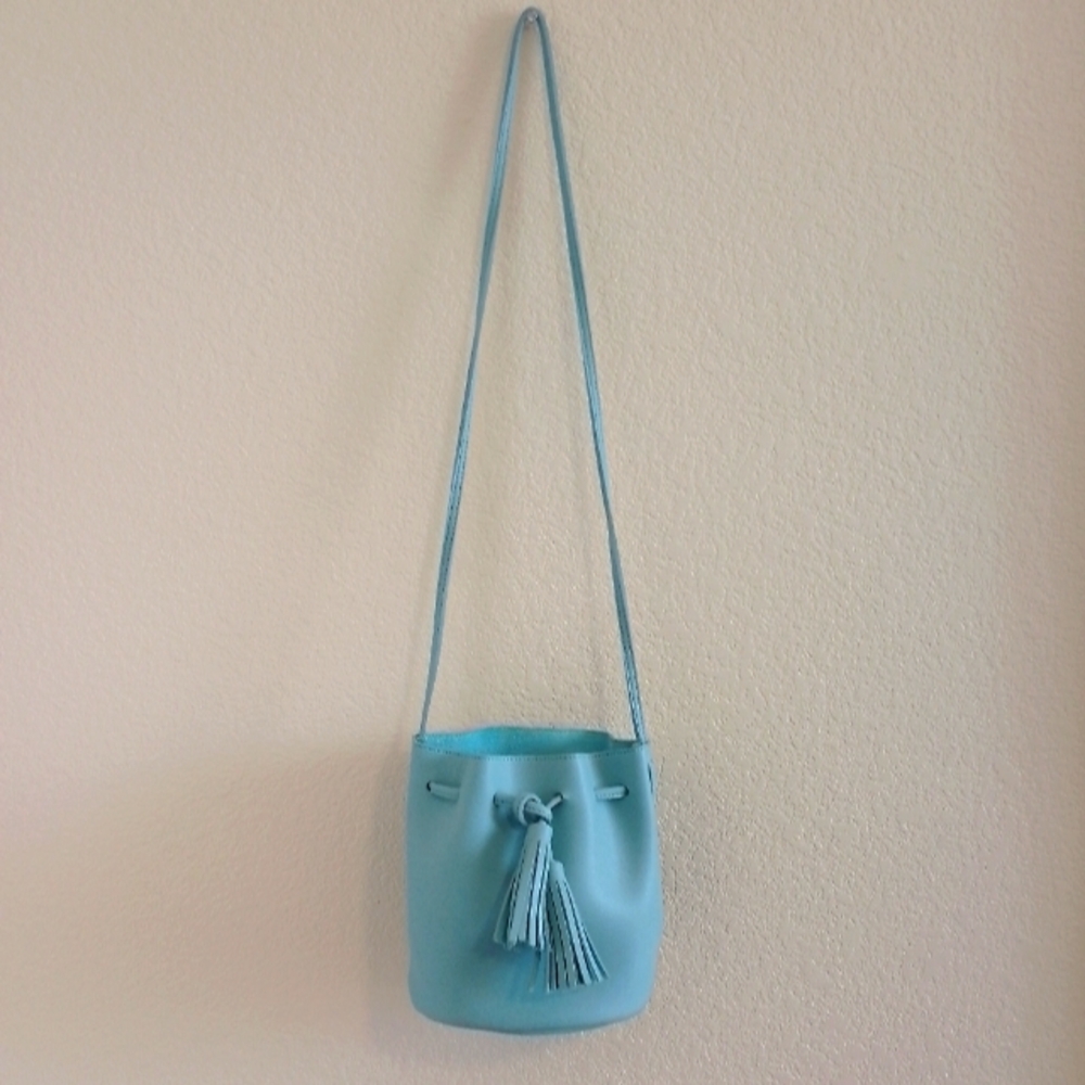 Light blue miniso small bucket drawstring bucket bag